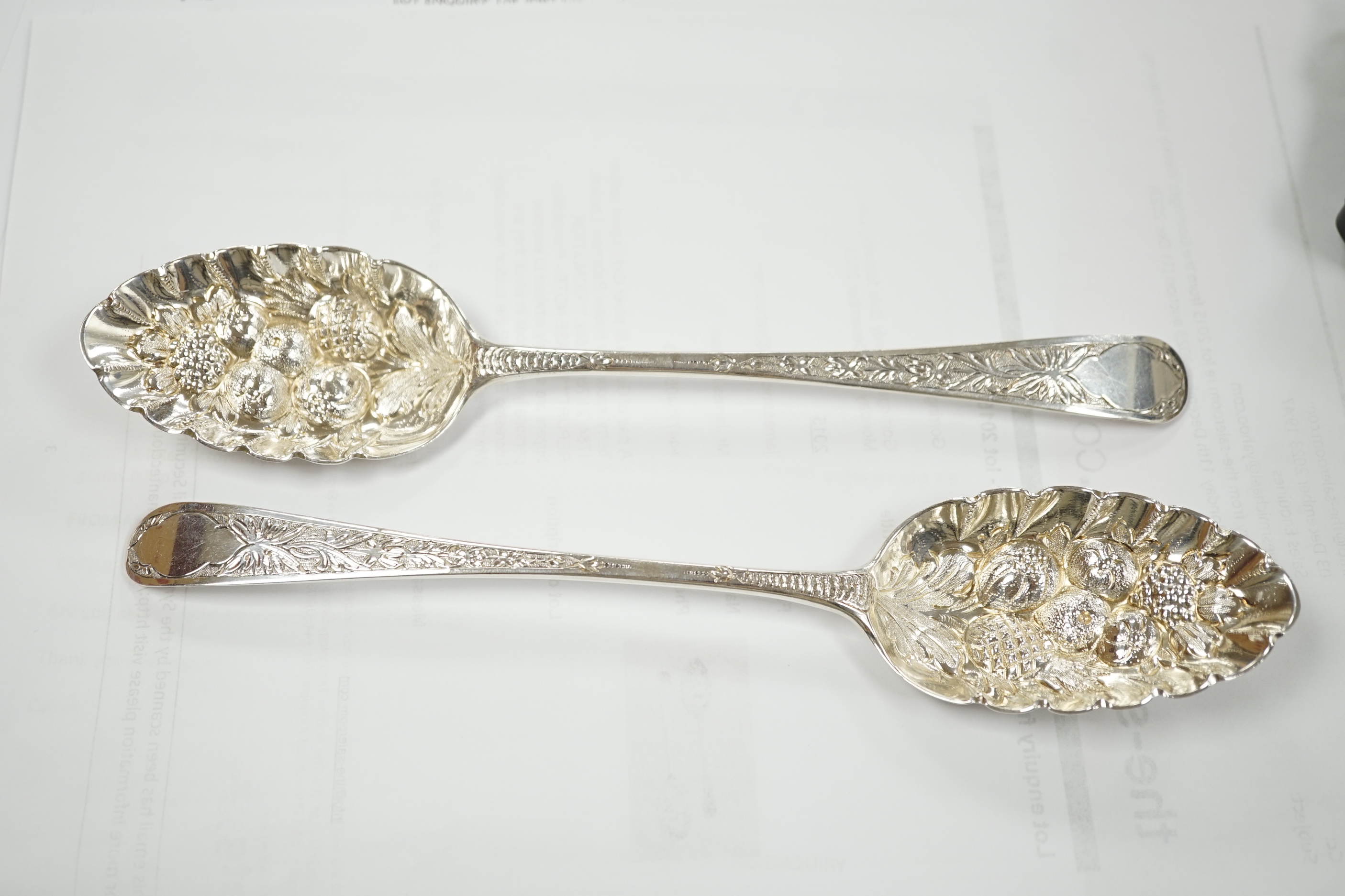 A pair of George III silver Old English pattern 'berry' spoons by Hester Bateman, London, 1784, 21.7cm, 3.6oz.